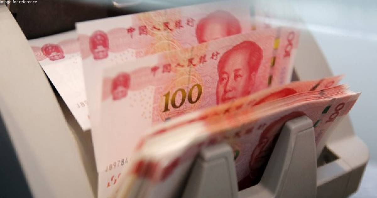 China's yuan sinks to record low against dollar ahead of key National Congress